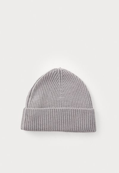 Gray knit beanie with a ribbed texture and a folded cuff. Rounded shape with a top seam detail. Made from a soft, stretchy material.