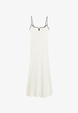 White midi dress with thin straps, v-neckline, and a fitted bodice. Features black trim along the neckline and hem, made from soft fabric.