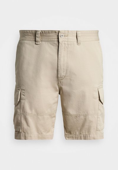 Bežinės cargo šortai pagaminti iš medvilnės, su keliais kišenėmis, mygtukų užsegimu ir siuvinėjimu aplink juosmenį bei siūles.