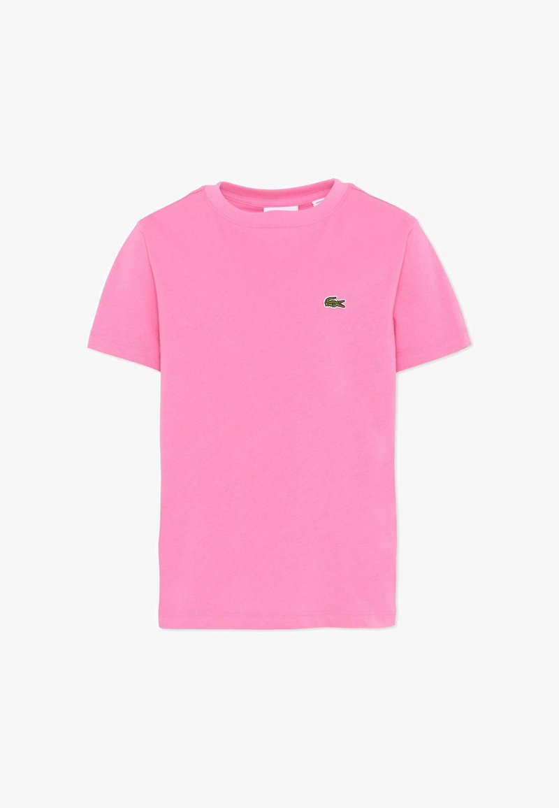 T-shirt rose à manches courtes et col rond avec petit logo crocodile vert brodé sur le côté gauche de la poitrine.