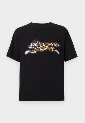 Black cotton t-shirt featuring a large, playful leopard print graphic in brown and beige with exaggerated facial features on the front.