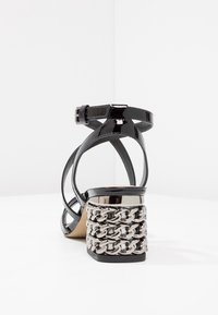 San Marina Sandaalit nilkkaremmillä - black