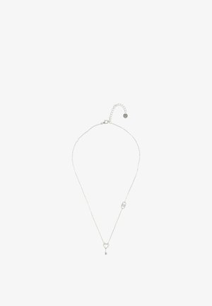 Nježna ogrlica od srebrnog lanca s privjeskom u obliku malog srca na kojem se nalazi ključ i podesivim kopčom s okruglom značkom.