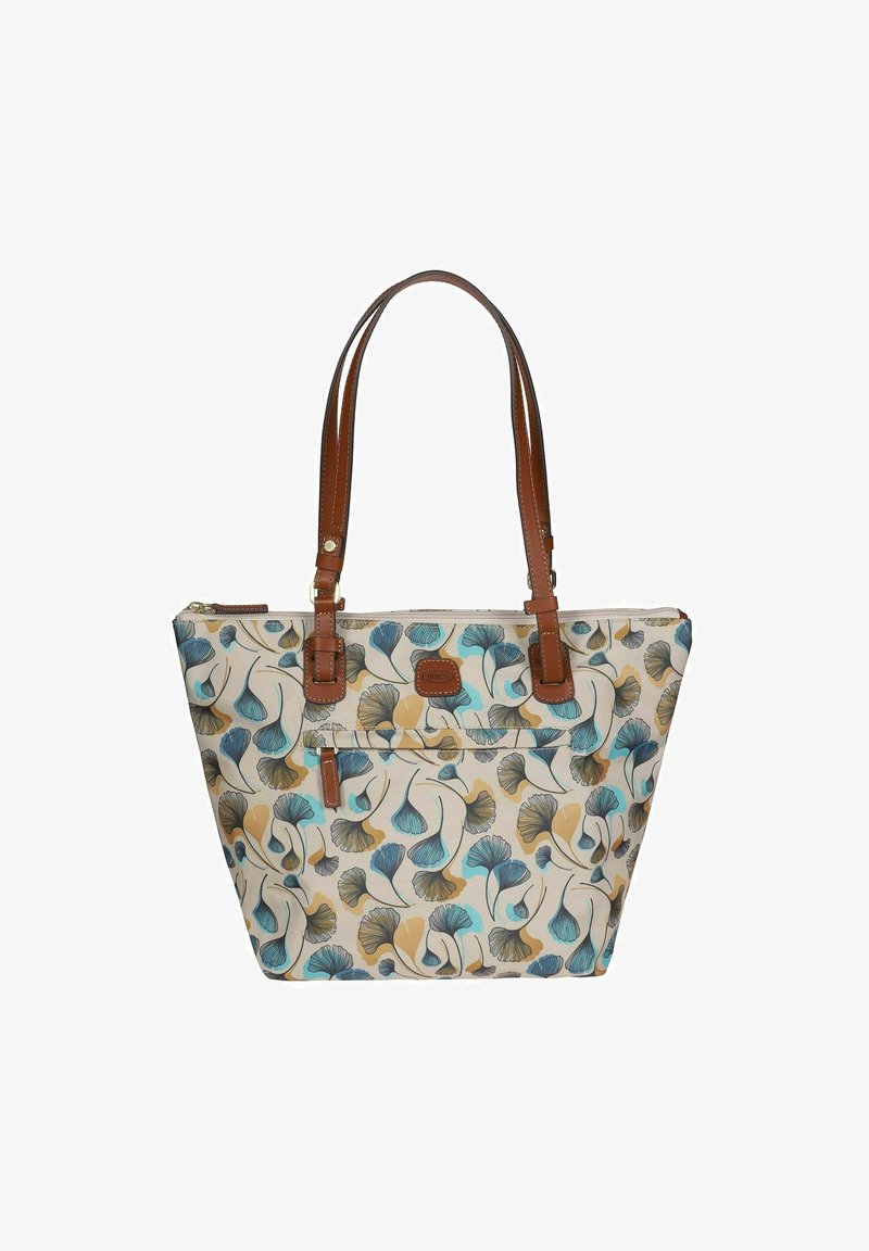Sac fourre-tout avec un motif floral comprenant des feuilles de ginkgo bleues et beiges sur un fond crème, des poignées en cuir marron et une fermeture éclair.