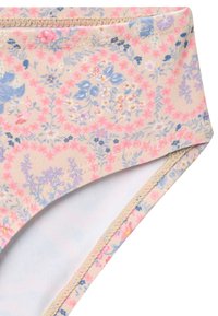 Bas de bikini à imprimé floral aux couleurs pastel, en tissu lisse avec des bords cousus. Le motif comprend de petites fleurs bleues et roses sur un fond beige.