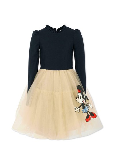 Langarm-Navy-Topkleid mit Rüschenkrause und beigem Tüllrock mit einem Minnie Mouse Druck, roten Schuhen und einer Schleife.