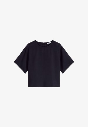 Blouse noire courte avec manches courtes larges et encolure ronde, dotée d'une fermeture éclair au dos.
