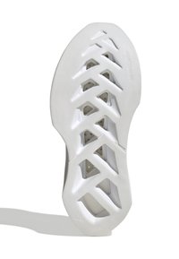 Suela de zapatilla deportiva blanca con un diseño texturizado, cortes diagonales y una superficie lisa; material ligero con detalles de marca.
