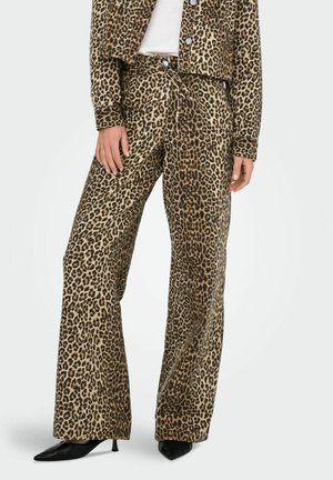 Leopard print trousers made of soft fabric; high-waisted with a wide-leg design. Features a patterned texture and black pointed heels.
