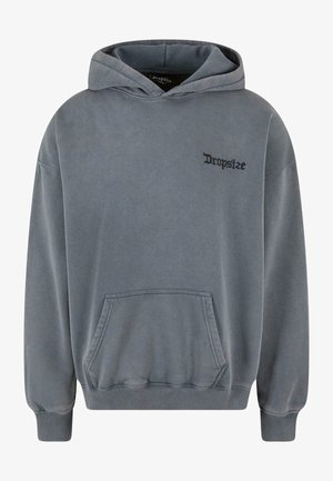 Szara bawełniana bluza z kapturem, z regulowanym sznurkiem, przednią kieszenią, ściągaczami na mankietach oraz małym czarnym logo na piersi. Miękka w dotyku, casualowy krój.