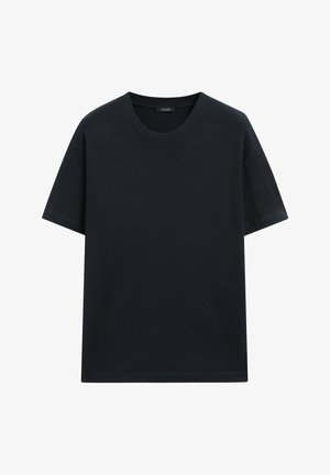 Czarny t-shirt z krótkim rękawem wykonany z bawełny. Posiada okrągły dekolt i luźny krój, z wykończeniami bez wzorów i akcentów.