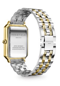 Montre Rosefield avec un boîtier rectangulaire en acier inoxydable, bracelet en maillons argent et doré, mouvement japonais et fond en acier inoxydable.