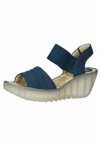 Sandalias de cuña azules con una correa elástica en el tobillo, parte superior cruzada acolchada, plataforma transparente y un patrón de flores decorativo en la plantilla.