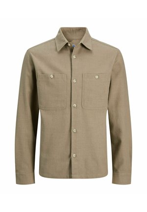 Brun skjorte med knapper lavet af struktureret stof, med spids krave, to brystlommer og standard knaplukning foran.