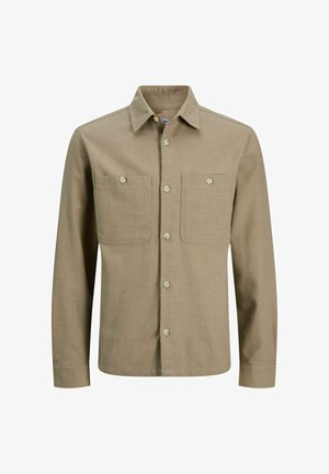 Brun skjorte med knapper lavet af struktureret stof, med spids krave, to brystlommer og standard knaplukning foran.