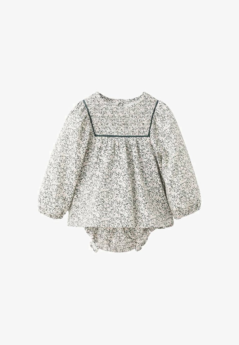 Puzdan romper za dojenčke s cvetličnim vzorcem v beli in zeleni barvi, ki ima napihnjene rokave, nabirke in zbrano hrbtno stran s pritrdilnimi gumbi.