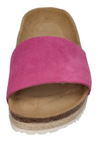 Pink suede slide sandal with a wide strap, contoured beige footbed, and a textured natural fiber sole. Smooth interior with rounded edges.