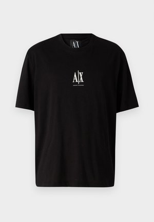Svart bomull T-skjorte med korte ermer, rund hals, og en liten hvit logo "A|X" sentrert på brystet.
