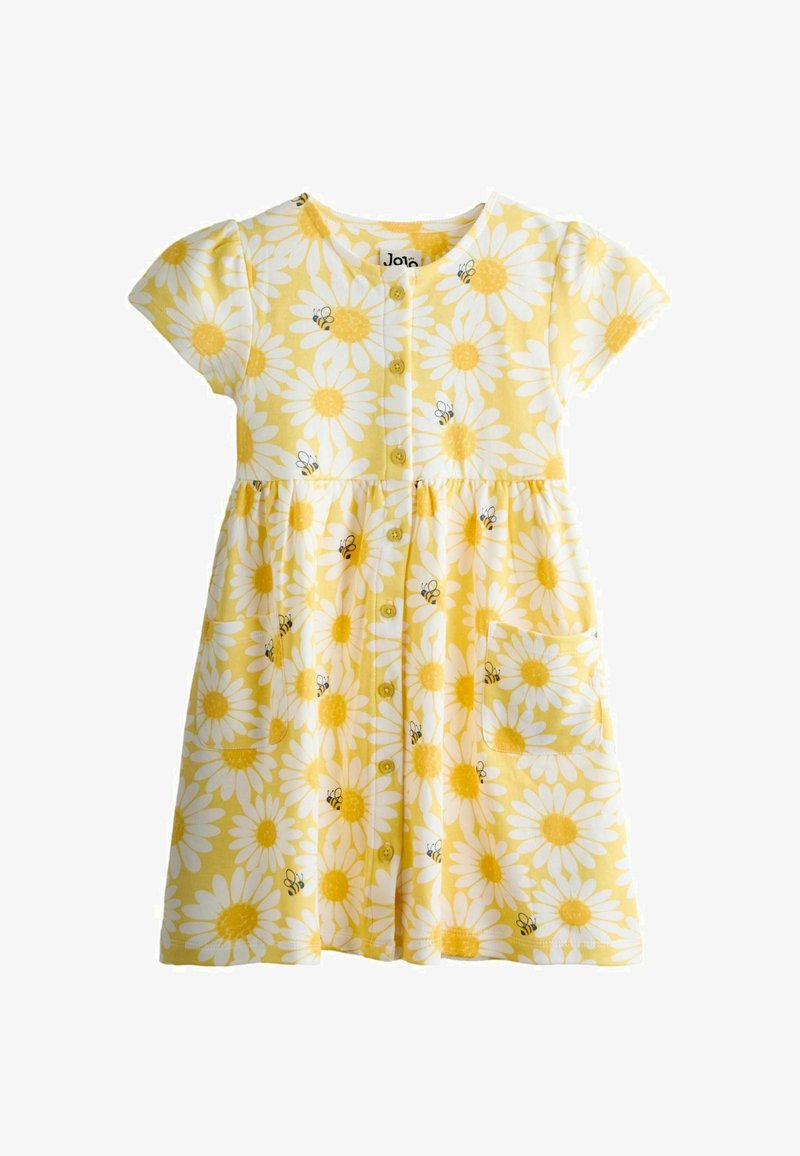 Vestido amarillo de manga corta para niño pequeño con margaritas blancas y pequeñas abejas, cierre frontal de botones y dos bolsillos delanteros.
