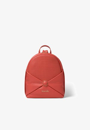 Red faux leather backpack with a woven texture front, a rounded top, and a gold-ring accent. Features a flap design and logo detail.