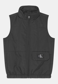 Svart ärmlös zip-up väst med hög krage och en framficka med en Calvin Klein Jeans logotyp patch.