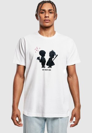White cotton t-shirt featuring a black silhouette design of a boy and girl, with hearts above and text reading "BOY MEETS GIRL" below.