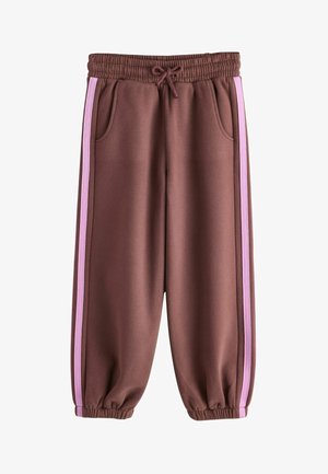 Brune joggingsbukser med elastisk talje og manchetter, med lyserøde striber ned langs siderne og forlommer.
