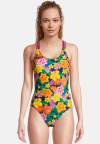 Maillot de bain fleuri multicolore avec un fond marine, présentant des fleurs roses et jaunes, des bretelles larges et une coupe ajustée.