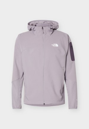 Chaqueta con capucha de color púrpura claro, cremallera frontal, bolsillo con cremallera en la manga izquierda y el logo blanco de The North Face en el pecho.