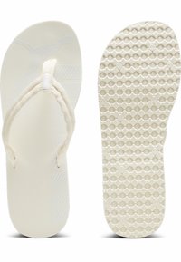 Infradito bianche con suola in gomma texturizzata e cinturini intrecciati. La soletta presenta un design del logo sottile. Sul fondo c'è un motivo a punti per la presa.