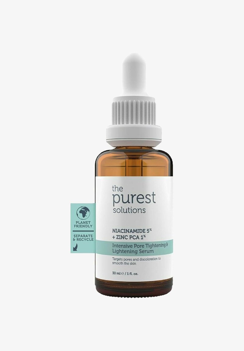 Amber glazen pipettenfles met een witte deksel. Etiket met blauwe en witte tekst over niacinamide en zink PCA voor het verstrakken van de poriën. 30 ml.