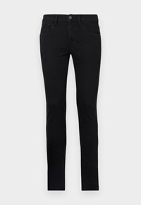 Jeans negros ajustados de algodón, con cierre de botón en la parte frontal, dos bolsillos frontales y una textura suave con mínimos detalles.
