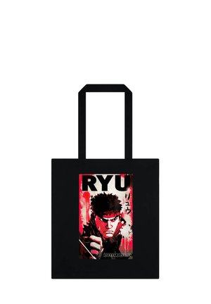 Sac cabas noir avec un graphisme rouge et blanc de Ryu de Street Fighter, montrant son visage, son poing et du texte en anglais et en japonais.