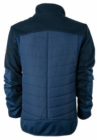 Giacca blu navy con un corpo trapuntato caratterizzato da una texture liscia e una parte superiore in maglia lavorata, creando un effetto a strati.