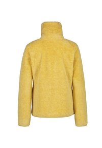 Giacca in fleece gialla con una finitura morbida e testurizzata, colletto alto e maniche lunghe; presenta una silhouette rilassata e senza chiusure visibili.