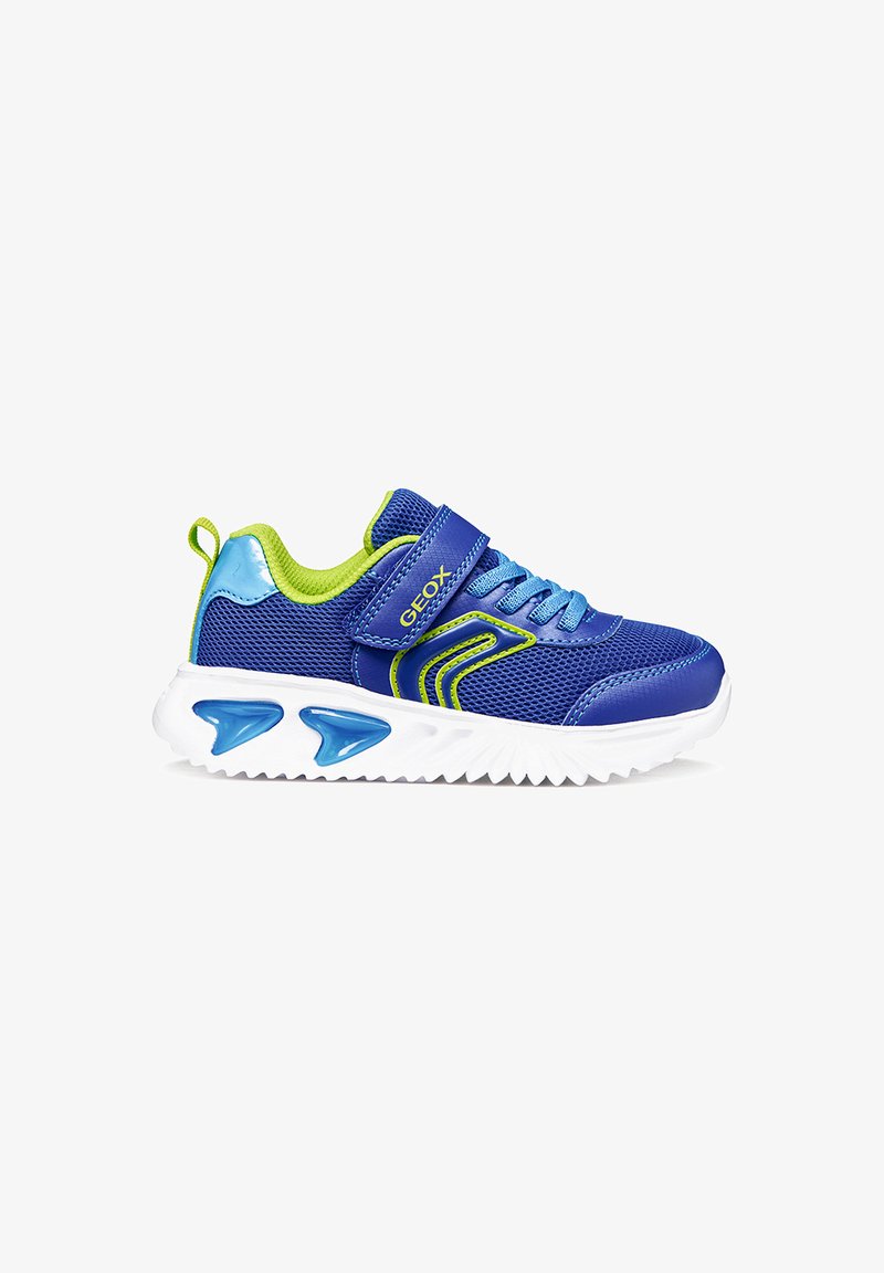 Baskets pour enfants bleu et vert avec dessus en mesh, bride à scratch, lacets, et semelle blanche avec détails bleus de coussin d'air.