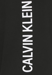 Calvin Klein Jeans Graphic Back Logo Hoodie Unisex Felpa Black Nero Zalando It Calvin Klein Jeans Graphic Back Logo Hoodie Unisex Felpa Black Nero Zalando It