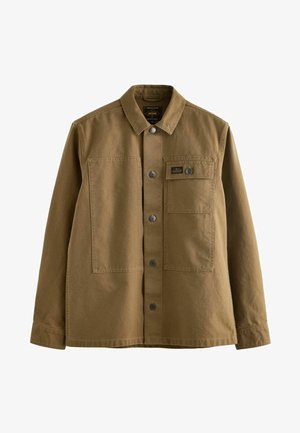 Giacca in tela marrone con colletto, chiusura anteriore con bottoni, due tasche sul petto e tessuto testurizzato. Design ispirato al militare.