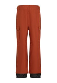 Orange waterproof snow pants with a relaxed fit, featuring cargo pockets and elastic cuffs. Smooth texture with contrasting black bottom section.