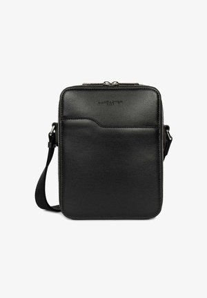 Borsa a tracolla in pelle nera con chiusura a zip, dotata di tasca frontale, una trama sottile e spallaccio regolabile. Misura circa 25x20 cm.