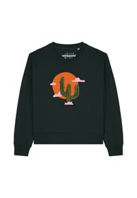 Zwarte sweatshirt met een cactusafbeelding tegen een oranje zon en roze wolken. Glad materiaal, ronde hals en geribbelde manchetten.