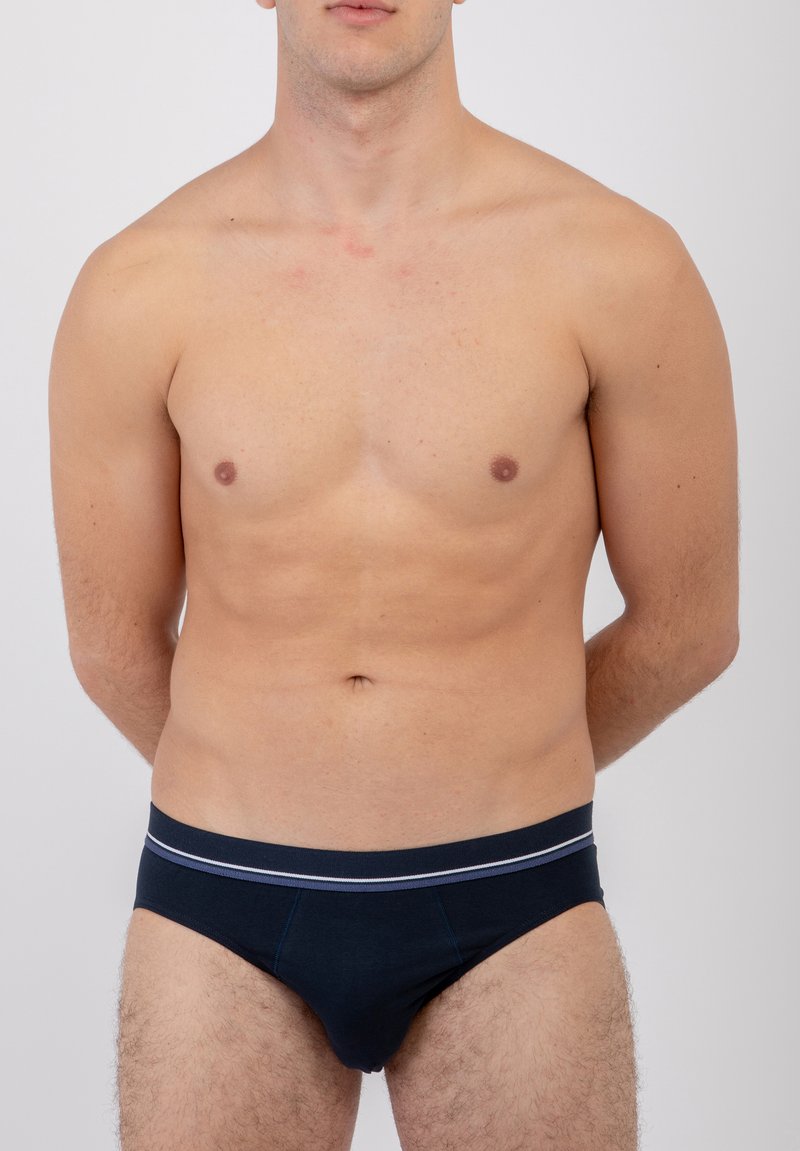 Slip in cotone blu navy con un cintura a contrasto, caratterizzati da strisce grigie chiare e un design aderente per comfort e supporto.
