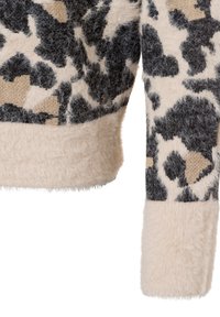 Sweater with a fuzzy beige band and a black and cream animal print pattern. Soft texture and slightly oversized fit with a cuffed sleeve.