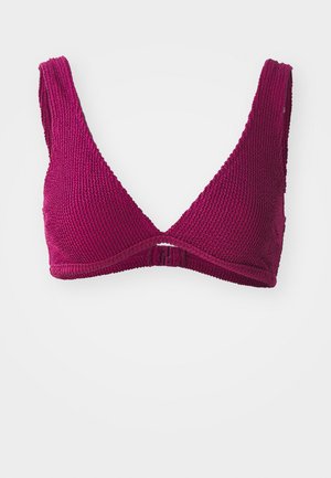 Magenta knitted triangle bralette with wide straps, textured fabric, and a hook closure at the back. Ideal for casual wear.