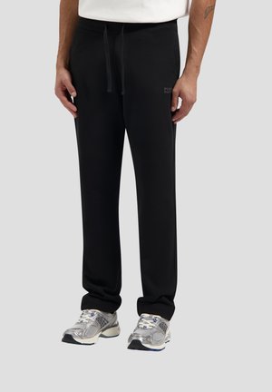 REGULAR FIT - Trousers - black