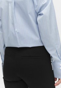 STOCKH LM Studio KAYLA CAPRI - Shortsit - black