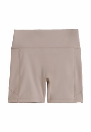 Beige, hoch taillierte, figurbetonte Sportshorts mit Seitennähten und Flatlock-Nähten, entworfen für aktive Bewegung und Komfort.