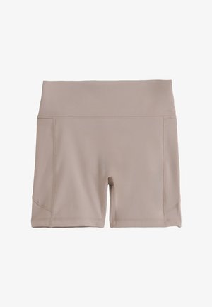 Beige, hoch taillierte, figurbetonte Sportshorts mit Seitennähten und Flatlock-Nähten, entworfen für aktive Bewegung und Komfort.