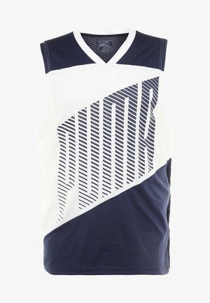 Débardeur de sport sans manches avec des blocs de couleurs bleu marine et blanc, ornée d'un texte "PUMA" en diagonale rayé sur le devant.