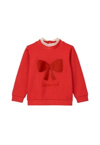 Felpa rossa con una grande applicazione di feltro a forma di fiocco sul davanti. Il pizzo sul collo aggiunge texture. Materiale morbido ed elasticizzato.
